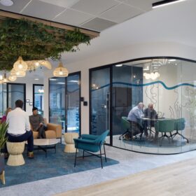 Project: BlueFloat | Products: Revolution 100 double and single glazed partitions, Optima 117 Plus Curved single glazing with Edge Symmetry Doors