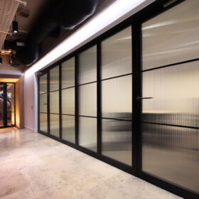 Project: Warner Bros | Products: Technishield 50 Fire rated glass doors with side screens