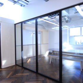 Project: Aura Power | Products: Revolution 54 Plus glass partitions with Edge Symmetry double door