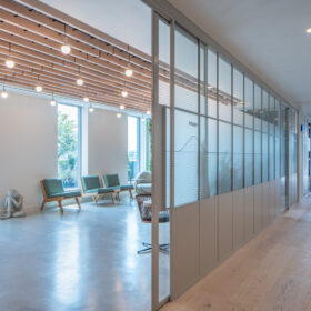 Project: Global Travel Search Company | Products: Kinetic Align sliding door with solid aluminium panels