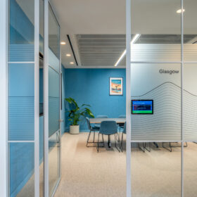 Project: Global Travel Search Company | Products: Revolution 54 Plus double glazed partitions with Edge Symmetry door