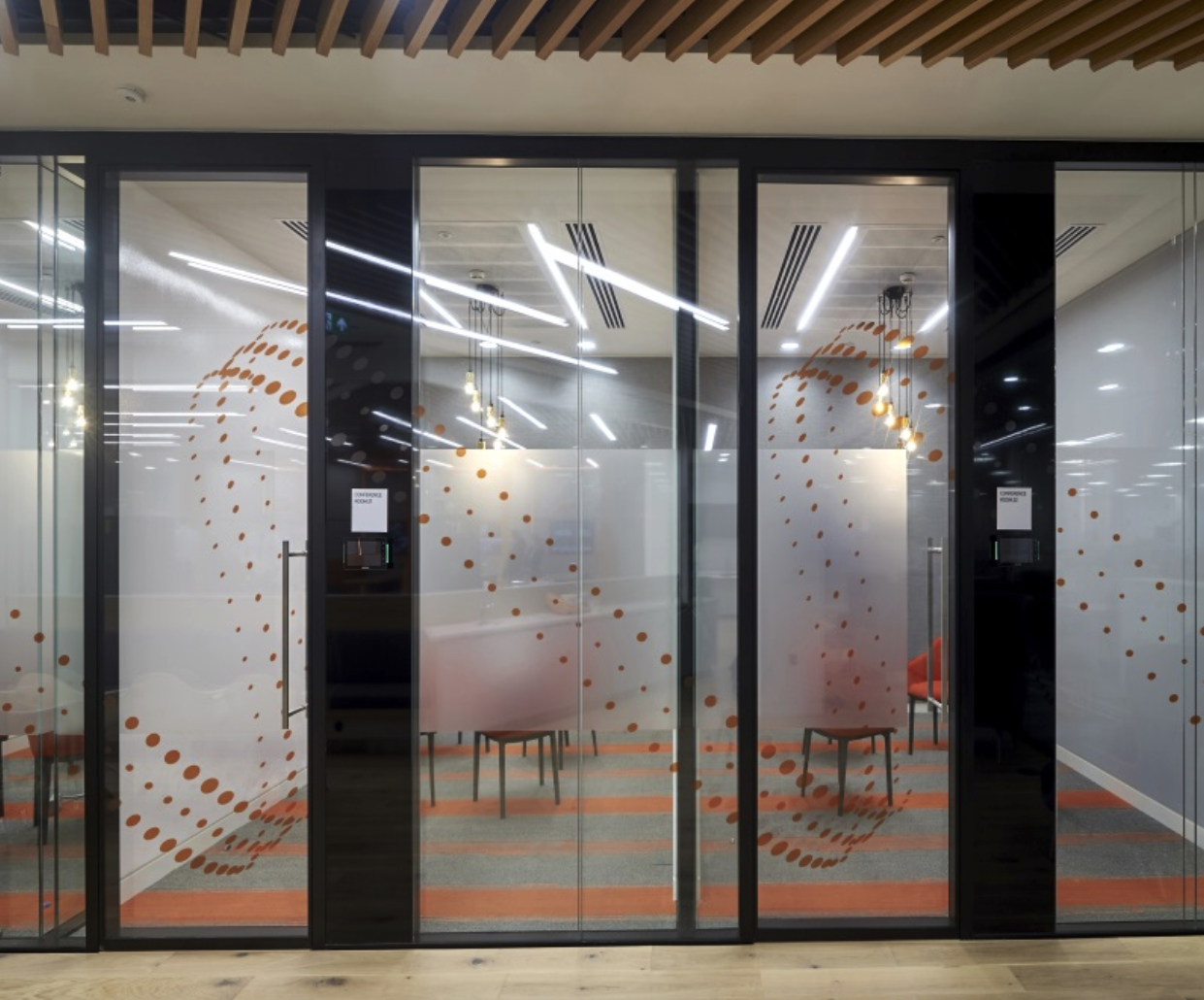 Doors with privacy glass to shield meetings