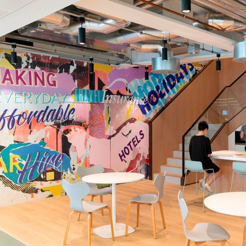 an office space incorporating art into the commercial office design