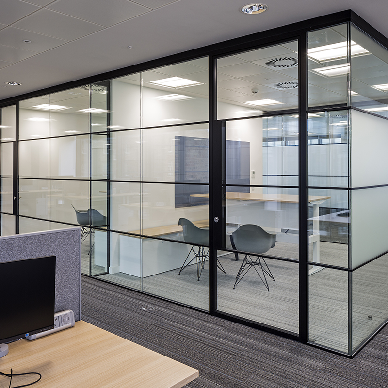 an image of black-framed glass partitions and doors