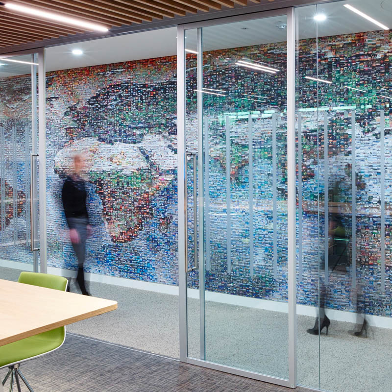 an office point that uses glass doors as a focal point