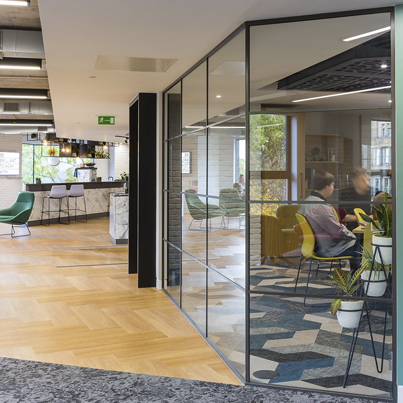 A glass office partition being used at Bruntwood in Manchester