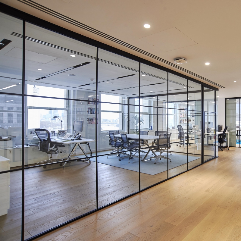 an image of a corporate office with a large glass partition wall system