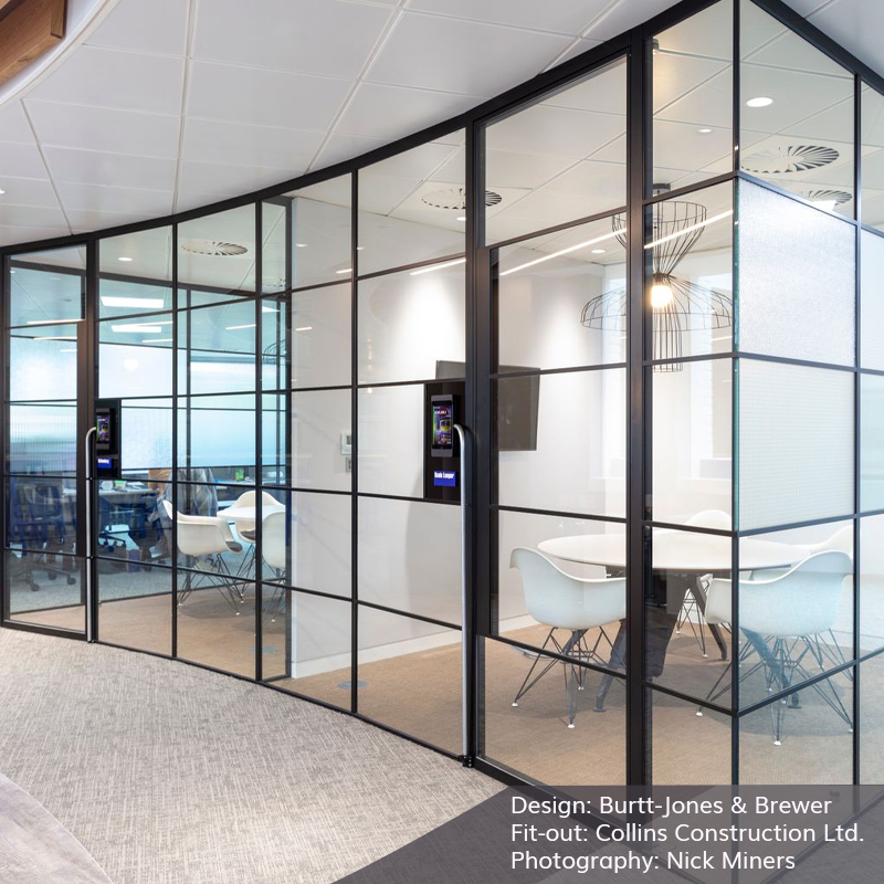 an image of an office glass door design with curved industrial glass