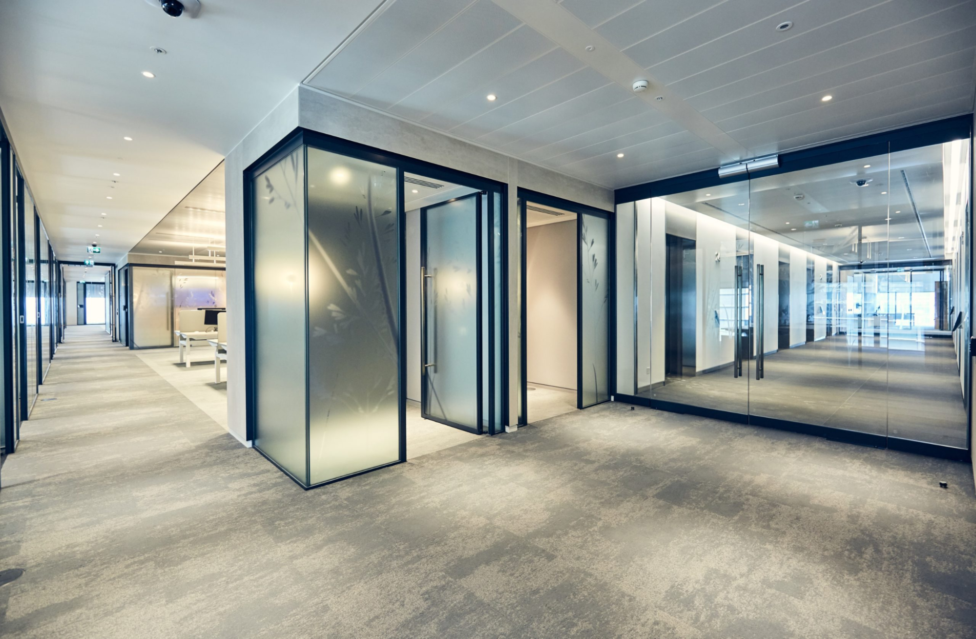 a law office interior design with a glass partition wall system