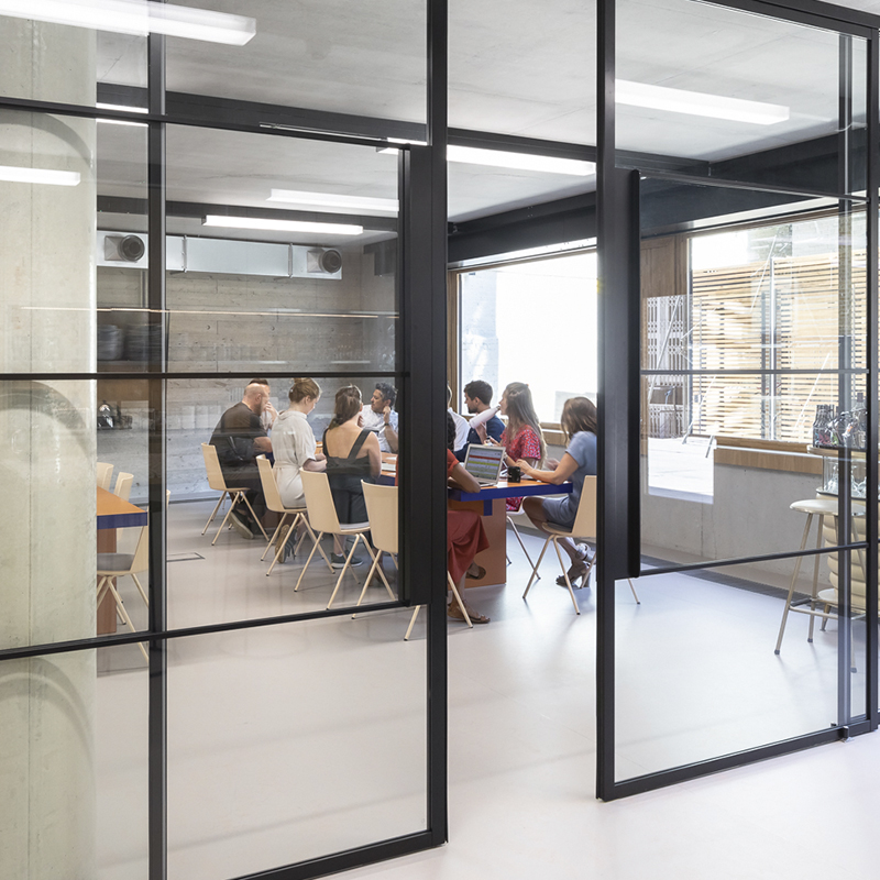 An image of glass doors in an office