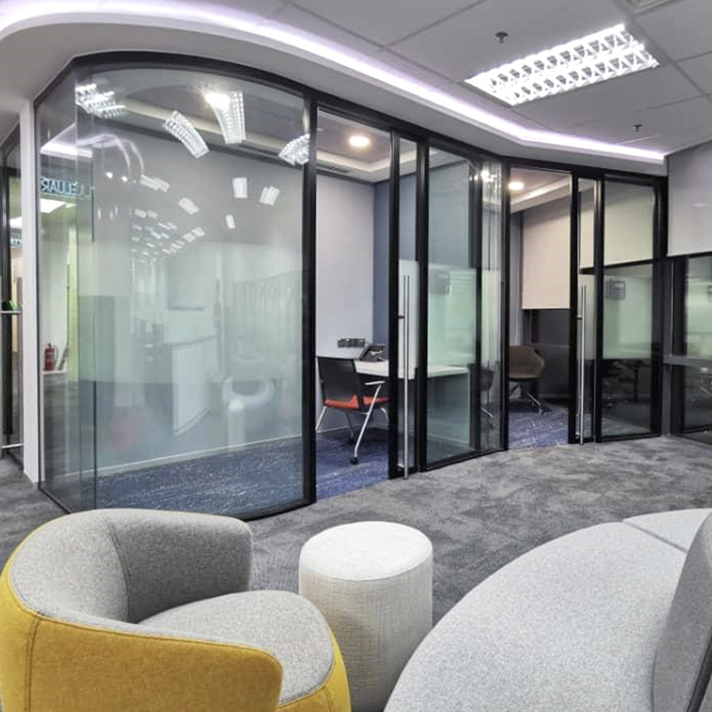 an image of a glass office door design with curved glass